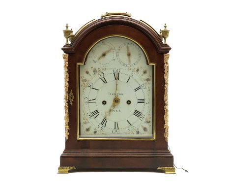 An early 19th century mahogany bracket clock, Denton, Hull,with an arched and painted enamel dial with subsidiary seconds and