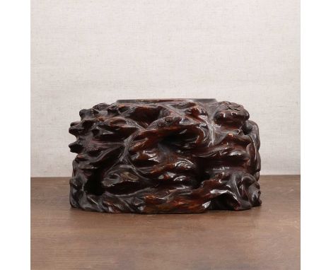 A Japanese wood stand,20th century, of oval form, carved imitating a tree trunk,30cm longCondition ReportCracks, chips, and s