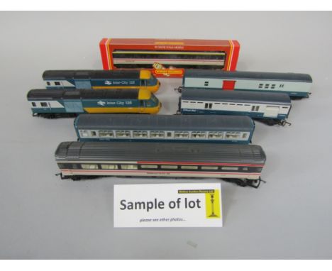 A Hornby R.488 BR Intercity 125 grey four car set, Intercity 125 blue livery set (8 items) a Hornby 25247 engine and four Roy
