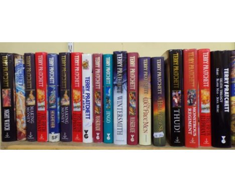 An extensive collection of Terry Pratchett titles including some first editions (approx 40 volumes)