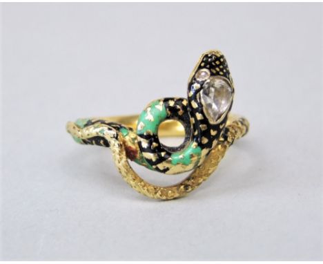 Interesting antique ring in the form of a coiled snake, possibly Indian, the head set with a pear cut diamond and with rose c