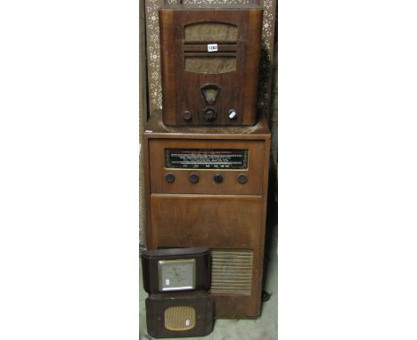 A Phillips valve radio in a walnut case, type 588A4 no 228678, an Atronic floorstanding valve radio model number EGA5347, tog