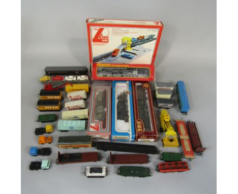 Various Hornby and Lima items including a Caerphilly Castle Airfix damaged engine and an Airfix black tank engine 