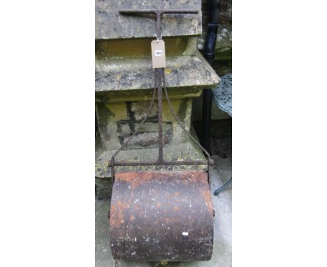 A 19th century cast and wrought iron garden roller, the open roll/drum with decorative pierced ends and T shaped handle