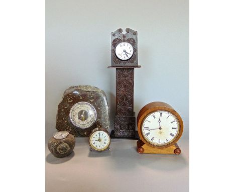 A collection of various horology pieces to include a miniature longcase clock, a further oak drum head mantle clock, The Brit