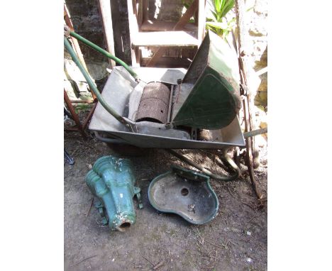 A vintage Ransomes twelve inch Ajax mark 5 cylinder lawn mower together with a galvanised wheelbarrow, two pairs of Hames rec