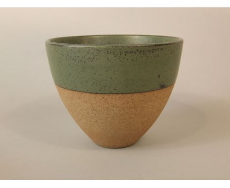 A studio pottery bowl by Robin Welch, of flared form with speckled green glaze finish and impressed mark, 16cm diameter appro