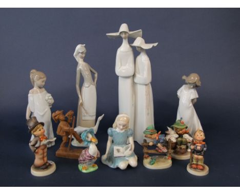 A Lladro figure group of a pair of nuns, further Lladro figure group of a Goose girl, two Nao figures, a Royal Doulton figure