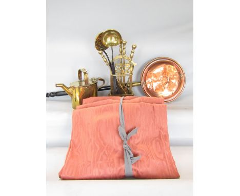 A mixed collection of metalware to include a small brass companion set, a brass watering can, a copper warming pan, together 