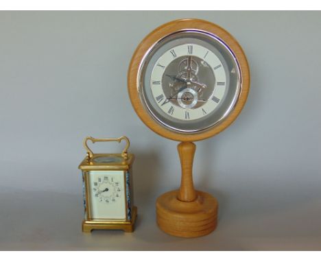 Brass cased carriage timepiece with floral enamelled dial and bevelled glass, flanked by cloisonne panels, 11 cm high; togeth