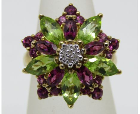 9ct floral cluster dress ring set with aventurine and iolite and diamonds to the centre, size K, 4.4g