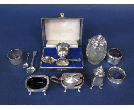 A mixed collection of various silver items to include three piece silver cruet comprising salt, pepper and mustard, three sil