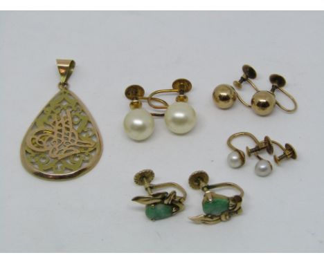 Eastern bi-colour yellow metal pendant, indistinct stamps to bale, together with four pairs of gold earrings with screw faste