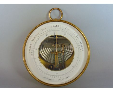 Circular brass cased Holosteric barometer, 14 cm diameter