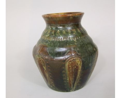 Christopher Dresser for Linthorpe pottery green glazed studio pot, with stepped shoulder relief and lobed bowl with thick gre