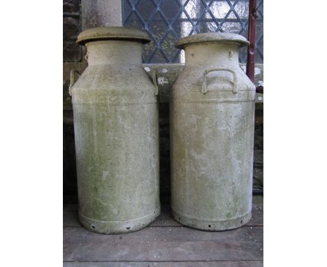 Two vintage aluminium/light steel milk churns and caps with later painted finish