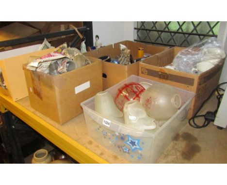 Eight boxes containing light shades, royal commemorative ware figures, etc