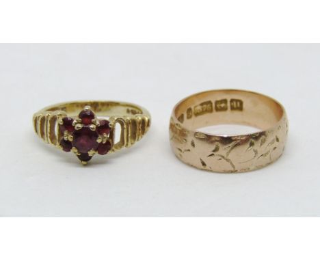 Two 9ct rings comprising a ruby flower head example and a rose gold wedding ring, sizes J/K and K/L, 5.5g total