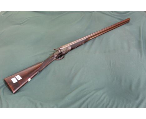 12B William Ford side by side double trigger hammer gun with 30" barrels, overall length 46 1/2", length of pull 14.5", seria