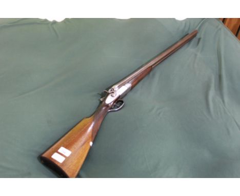 12B Italian (maker Vickers of Sheffield) side by side double trigger hammer gun with 27 1/2" barrels, overall length 47", len