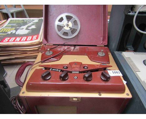 An Ampro model 731 reel to reel tape recorder