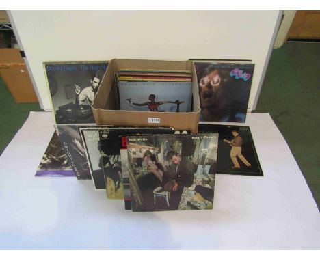 Mixed LP's including Paul Simon, Bruce Springsteen, Tom Waits, Don Henley, Dwight Yoakam, The Steve Miller Band, Donald Fagan