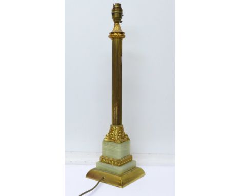 A gilt and onyx column table lamp