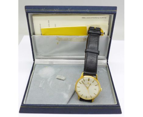 An 18ct gold cased Jaeger-LeCoultre wristwatch with papers, back engraved, boxed, 33mm case