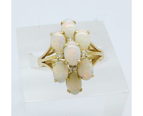 A 14ct gold, diamond and opal ring, 3.7g, Q