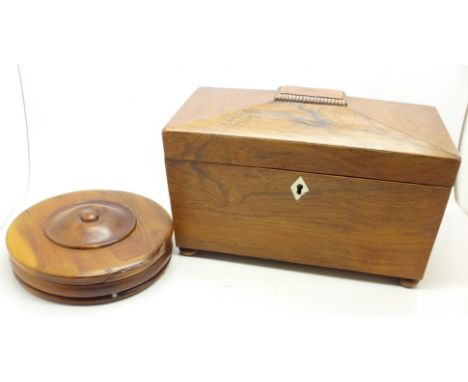 A sarcophagus shaped tea caddy, lacking interior fittings and a wooden circular box