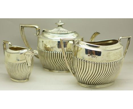 A Victorian three piece silver tea service, London 1894, 654g