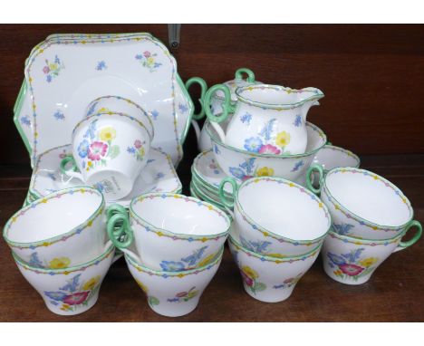 A Shelley Wild Flowers tea service, thirty nine pieces in total, cream a/f (small paint loss to rim)
