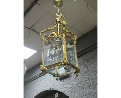 A GILT BRASS AND ENGRAVED GLASS SINGLE LIGHT HALL LANTERN the square frame with foliate and flower decoration containing etch