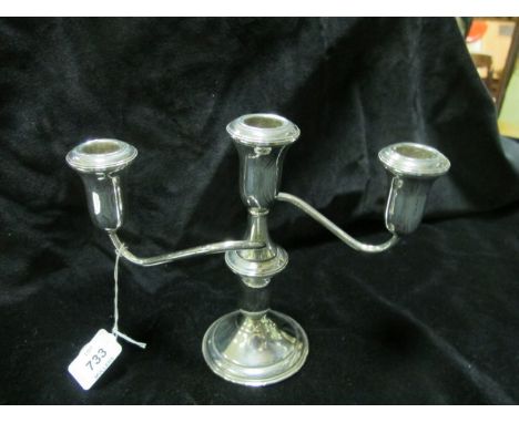 A STERLING SILVER THREE BRANCH CANDELABRA