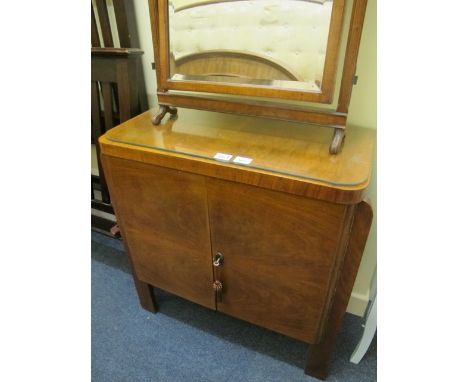 A WALNUT SIDE CABINET c.1930 the rectangular top with glazed top above panel doors on rectangular moulded legs 77cm (h) x 70c