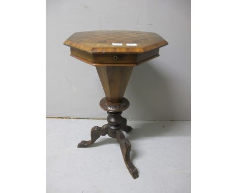 AN EDWARDIAN OAK KINGWOOD AND SATINWOOD INLAID WORK TABLE of octagonal outline the shaped moulded hinged lid containing compa