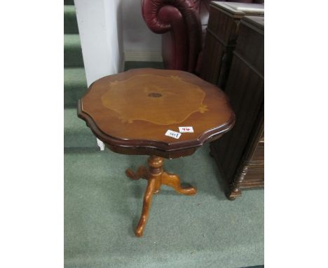 A CONTINENTAL WALNUT WINE TABLE the shaped moulded top above a baluster column on tripod support 58cm (h) x 53cm (w) x 53cm (