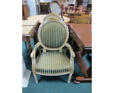 A PAIR OF CONTINENTAL GREY PAINTED AND PARCEL GILT SALOON CHAIRS each with a carved top rail above an oval upholstered panel 