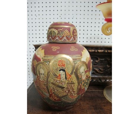 A PAIR OF SATSUMA LIDDED VASES each of baluster form the puce and light blue and cream ground decorated with figures and lake