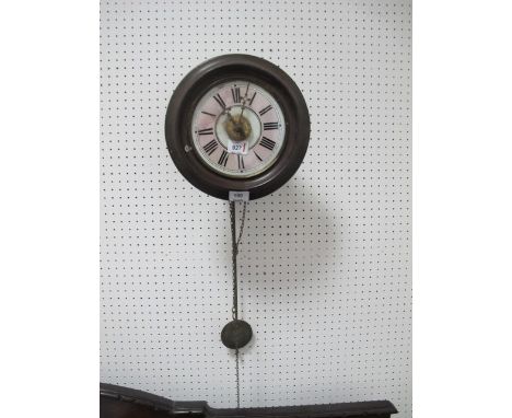 A VICTORIAN MAHOGANY CASED WAG OF THE WALL ALARM CLOCK the circular glazed dial with Roman numerals and brass pendulum 29cm d
