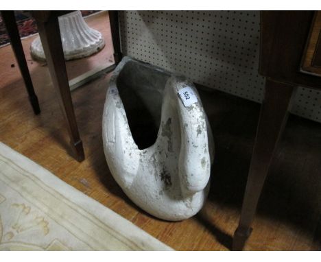 A COMPOSITION STONE PLANTER modelled as a swan 40cm high