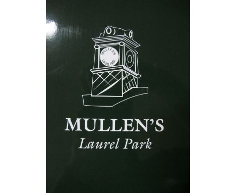 AN OAK FRAMED MIRROR together with a crutch frame mirror of oval outline and a mantle clock