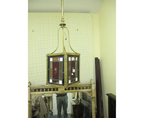 A VICTORIAN BRASS LEAD GLASS AND COLOURED GLASS SINGLE LIGHT HALL LANTERN 