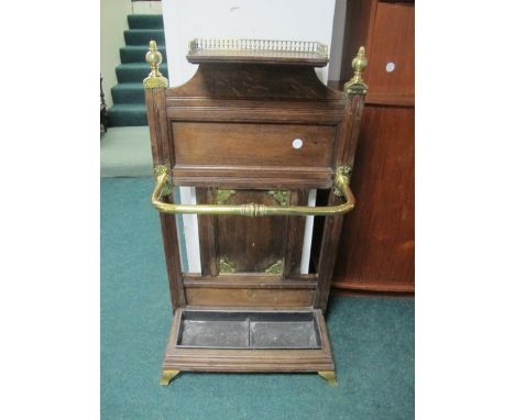 AN EDWARDIAN OAK AND BRASS BOUND STICK STAND bears label "Miller and Beaty Limited Grafton Street Dublin" 99cm (h) x 56cm (w)