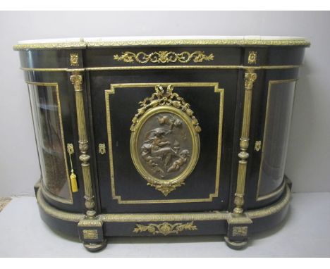 A FINE VICTORIAN EBONISED AND GILT BRASS MOUNTED SIDE CABINET of breakfront outline surmounted with a white vein marble top a