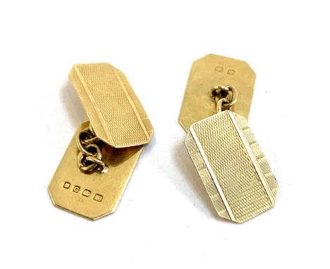 A pair of 18ct gold engine turned cufflinks, approx. 5.9g 