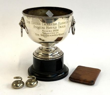 A plated trophy, 'The Hound Trailing Association, Annual Hound Trail, August 1958', 21cmH, together with a rare leather clad 