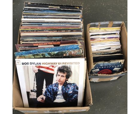 A quantity of vinyl LPs and 7 inch singles to include Bob Dylan, Led Zeppelin, The Beatles, Simon and Garfunkel, Creedance Cl