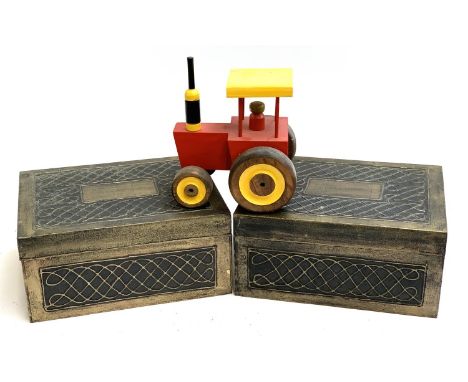 Two decorative storage boxes, 26x34x16cm, together with a wooden toy tractor 