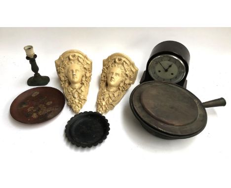 A mixed lot to include plaster wall sconces of bacchante maidens, lacquered dishes, copper pan, Enfield bakelite mantel clock